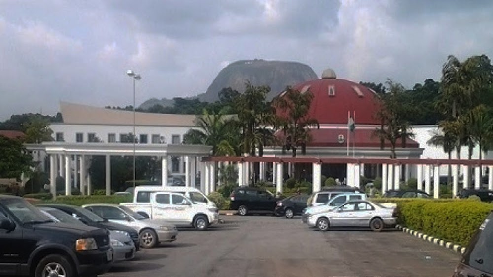 Aso Rock rising behind Abuja